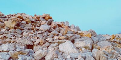 brown rocky mountain under blue sky during daytime
