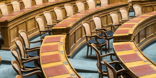 brown wooden chairs on blue and brown wooden floor